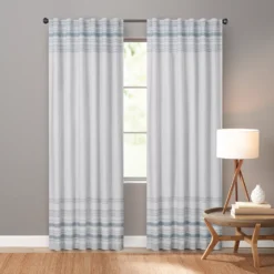 Sonoma Goods For LifeĀ® Ultimate Performance 2-Pack Blue Border 100% Blackout Curtain